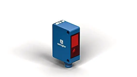 A blue device with red light on top of it.