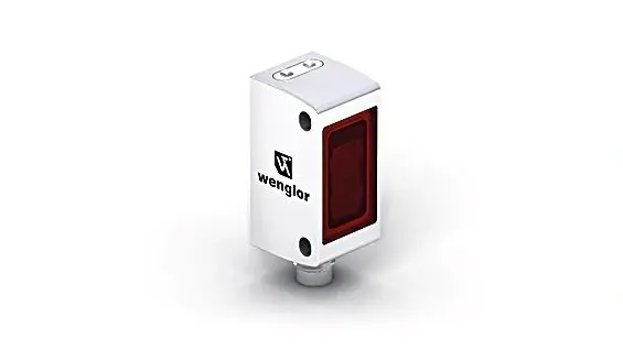 A white box with red light on top of it.