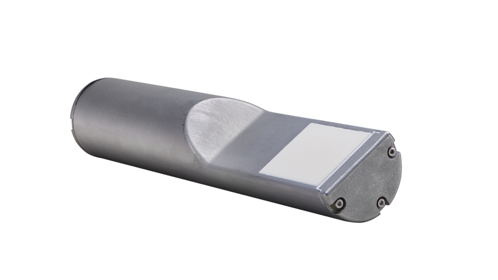 A close up of the side of a metal tube